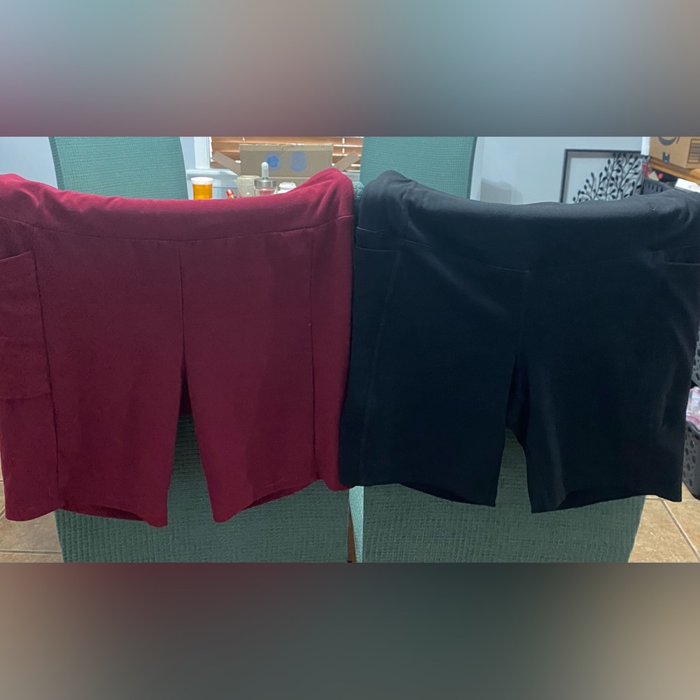 two pair of women’s spandex workout shorts